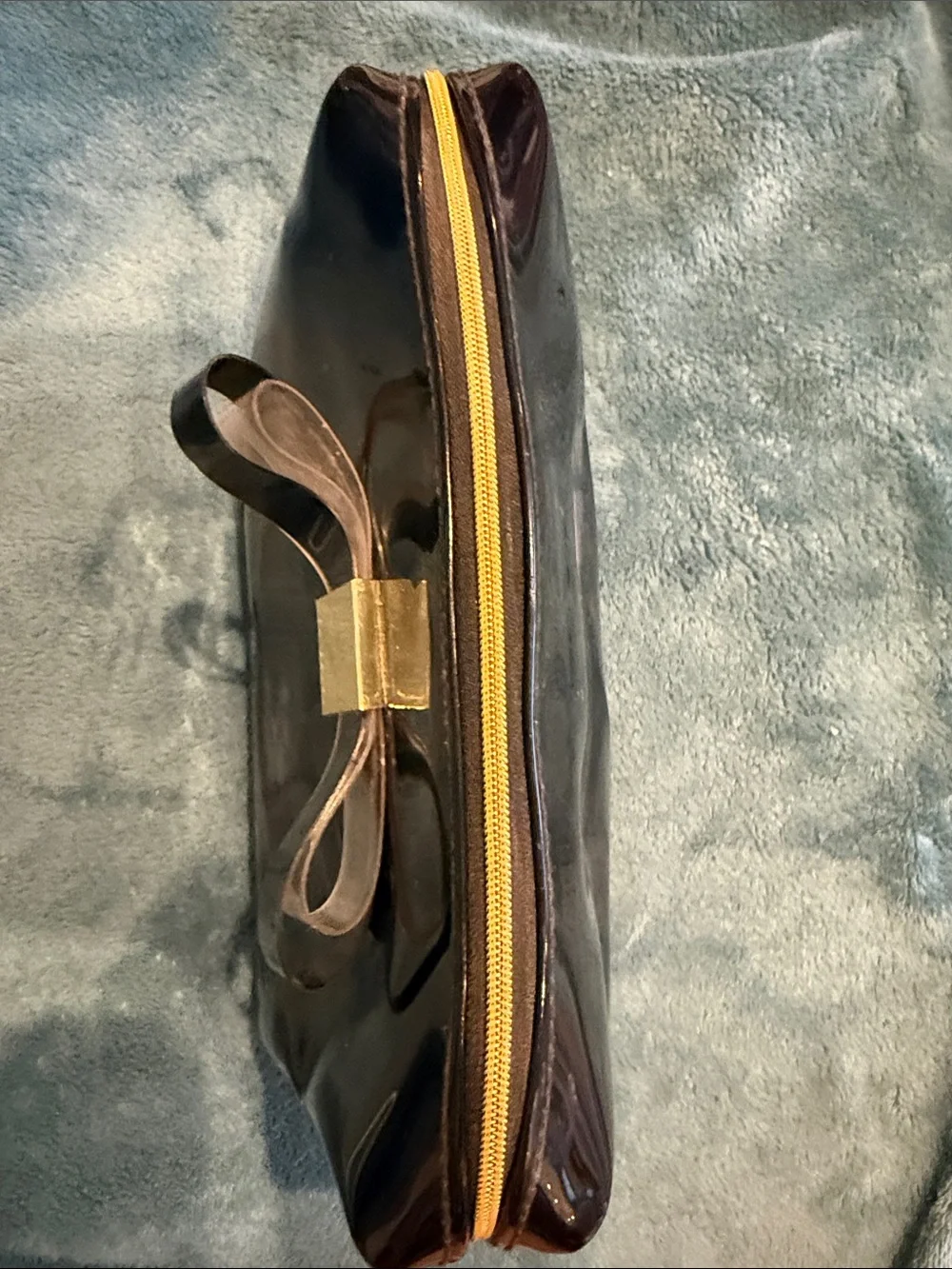 Ted Baker Patent Bow Cosmetic Clutch in Black with Gold Accent
